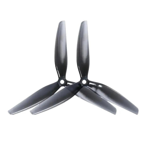 7 Inch Tri Propeller Set 7X4X3 Dual Direction Polycarbonate Props 2CW 2CCW For FPV RC Drones in Light Grey, aerial view.