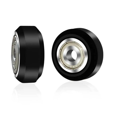 Ender 3 3D Printer Wheel Kit With POM Wheels And 625zz Bearings, shown in close-up view displaying two plastic pulleys and bearings.