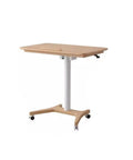 Tough Mobile Sit Stand Desk With Quick Gas Spring Lift And Smooth Locking Casters For Home Office Laptop Cart in light wood.