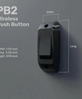 Slick Wireless Gate And Door Access Push Button Surface Mounted Momentary Release Switch on a wall, measuring 1.33x3.22x0.98 inches.