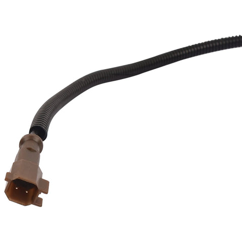 Close-up of an automotive electrical connector wiring harness, showcasing a brown connector and black spiral wrap.