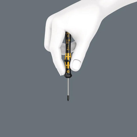 Hand holding ESD Safe Kraftform Micro Slotted Screwdriver with Ergonomic Multi Component Handle Anti Roll Design Swivel Cap Precision Magnetic Tip