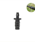 One Quarter Inch To Five Sixteenth Inch Barbed Reducing Drip Irrigation Fittings Kit For One Quarter And Five Sixteenth Inch Tubing Easy Install Black Plastic Connectors For Garden Watering System, close-up of a black plastic connector.