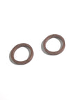 Overhead view of two brown rod wear rings for a waterjet pump BHDT.