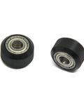 Top Shelf Pom V Slot Wheels And Pulleys Kit With Double Bearings Plus hexagonal eccentric posts and round spacers, black POM pulleys with bearings.