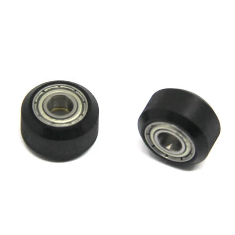 Top Shelf Pom V Slot Wheels And Pulleys Kit With Double Bearings Plus hexagonal eccentric posts and round spacers, black POM pulleys with bearings.
