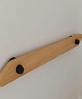 Solid Wood Wall Mounted Handrail With Anti Slip Ergonomic Grip For Indoor Outdoor Stairs And Hallways No Sweat Diy Installation Dead Steady Support Knockout Family Safety Four Foot Long Section attached to wall with black mounting hardware.
