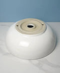 USZWBY Vessel Sinks Modern Simple Round Sink Home Bathroom Above Counter Basin ceramic sink base view on marble surface.