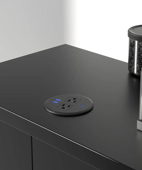 Two Pack Desktop Power Grommet PD20W Fast Charging USBC Three Inch Round Flush Mount Desk Outlet with two AC outlets on a black surface.