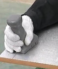 Hand using Pro Grade Pre Insulated Duct Panel Cutter Kit With Five Cutter Heads Featuring Straight, 45 Left, 45 Right, Side Shape, And V Shape Cuts Color Coded For Quick ID Works With Polyurethane Duct Panels on edge of duct panel.