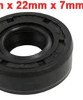 Front view of black rubber oil seal 10x22x7 mm, double-lip TC for rotary shafts.