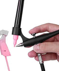 Close-up of Slick Portable Marker Airbrush Sprayer Kit For Smooth Coloring And Hassle Free Paint Swapping With Fine Mist Coverage and Universal Adapter Connector, showing hand holding device with pink marker.