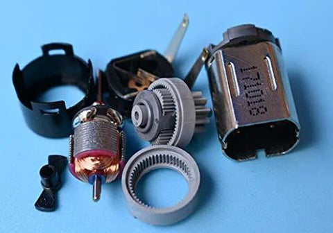 Micro Planetary Gearbox DC Motor disassembled components for DIY robots high torque at 3V to 5V, includes gears and casing.