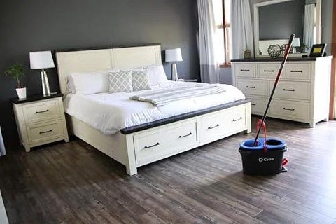 RinseClean Spin Mop And Bucket System For Clean Water Mopping Lets You Clean With Clean Water From Start To Finish Removes 99 Percent Of Bacteria With Just Water Built In Foot Pedal For Hands Free Wringer And Easy Rinse visible in bedroom with wood floors.