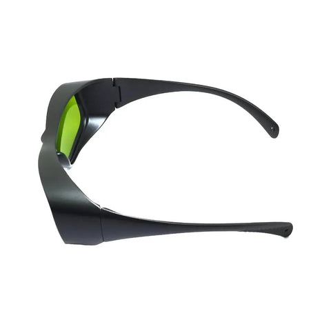 Top Tier Infrared Laser Safety Glasses Loaded With Multi Band Optical Density Shields And Slick Clear Lenses Crafted Hella Tough For Nd Yag Diode And Garage Laser Builds, side view with green lenses.