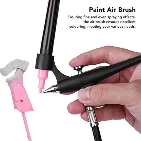Slick Portable Marker Airbrush Sprayer Kit For Smooth Coloring And Hassle Free Paint Swapping With Fine Mist Coverage And Universal Adapter Connector For Top Tier Model Crafting Gear, showing a hand-held airbrush with a pink marker.