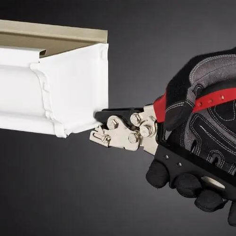 Snap Lock Punch For Gutters With Adjustable Throat Depth From One Quarter Inch To Five Eighths Inch, silver finish tool in use