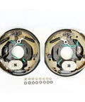 Two round trailer electric brake assemblies with green wiring and springs for 5-4.5 in bolt circle on a 3,500 lb axle