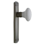 Side view of Prairie Plate With White Porcelain Lead Crystal Knob Door Passage Set In Antique Pewter, Solid Brass Plates