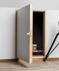 Premium Insulated Knee Wall Access Door With Rock Solid White HDF Boards And R Five Point Two Heat Blocking Rating For Attics And Basements Slick Operation 27 By 35 Inches open, showing storage space.