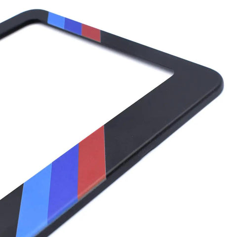 Close-up of Matte Aluminum Alloy License Plate Frame Kit For BMW Front And Rear Mount with sports logo and three color design.