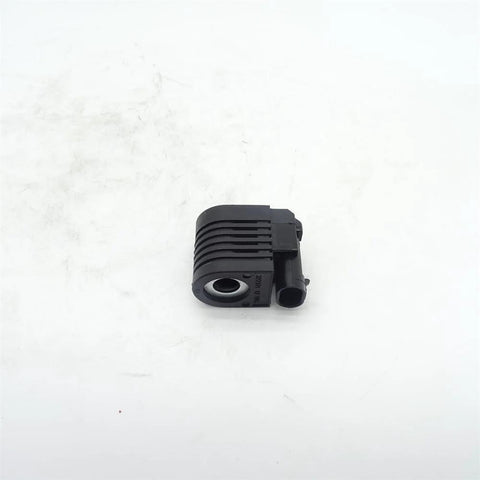 KV23085 solenoid valve coil for CT322 loader skid-steer; black ribbed plastic housing with side connector