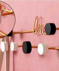 Dope Gold or Black Iron Wall Hook Shelf Decorative Rack for Keys Coats and Hats Perfect for Front Door Entryway with round hooks.