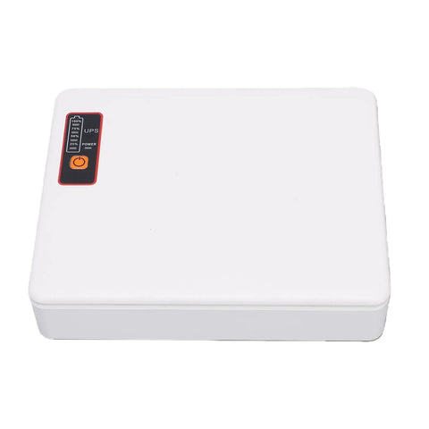Rock Solid Mini Ups Battery Backup For Router And Modem Keeps Your Home Network Running Smooth During Sudden Power Outages With 20800Mah Capacity Us Wall Plug, white unit with power indicators.