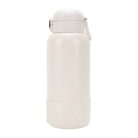 Top Shelf Portable Milk Warmer With Hella Quick 50W Heating Cordless Rechargeable Baby Bottle Heater Featuring Smart Constant Temperature Control For Travel And Outdoor Adventures side view of white portable bottle warmer with lid on