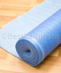 Heavy Duty 3In1 Vapor Barrier Flooring Underlayment 2Mm Thick With SelfSealing Tape Strip Covers 500 Square Feet rolled out on hardwood.