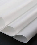 Dope 50 Sheets White Carbon Paper Set With Graphite Transfer Tracing Paper, showing close-up of A4 size sheets layered together.