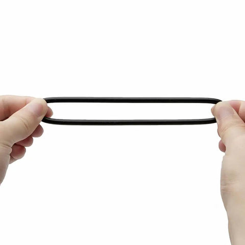 Hands holding a Universal Sewing Machine Stretch Motor Belt 13 To 15 Inch Easy Fit Replacement Belts 2 Pack in black nitrile rubber material.