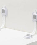 No Drill Anti Tip Furniture Straps With Heavy Duty Adhesive Wall Anchors attached to a wall, ready for securing heavy furniture.