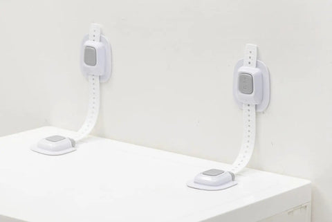 No Drill Anti Tip Furniture Straps With Heavy Duty Adhesive Wall Anchors attached to a wall, ready for securing heavy furniture.