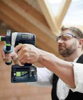 Pro using Badass Cordless Drill Driver Featuring Ec Tec Brushless Motor High Torque Heavy Duty Power Tool on beam.
