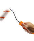 Kickass 4 Inch Paint Rollers Set Of 10 Featuring Heavy Duty Chrome Handles And Ultra Plush Microfiber Covers Quick Change Setup For Ridiculously Smooth Wall Painting Jobs with a roller in hand.