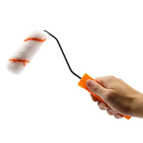 Kickass 4 Inch Paint Rollers Set Of 10 Featuring Heavy Duty Chrome Handles And Ultra Plush Microfiber Covers Quick Change Setup For Ridiculously Smooth Wall Painting Jobs with a roller in hand.
