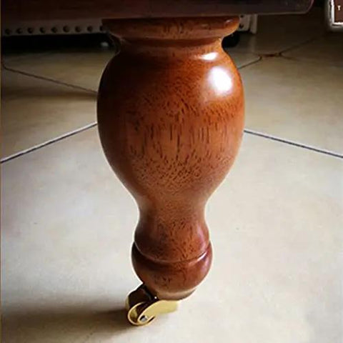 Heavy Duty Solid Brass Swivel Castor Wheels With Slick 360 Rotation And Dope Antique Vintage Gold Finish Easy Peasy Furniture Caster Replacement Kit For Couches Chairs Cabinets on wooden furniture leg.
