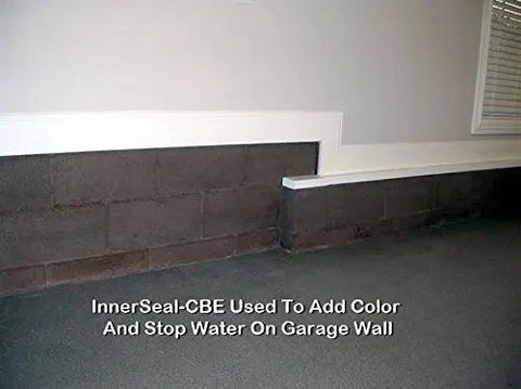 Superior Heavy Duty One Step Concrete Sealer And Curing Compound With Deep Penetrating Internal Moisture Vapor Barrier For Natural Stone And Cultured Rock Hella Tough Zero Hassle Protection applied to a garage wall.