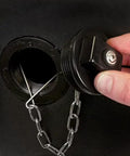 Close-up of the tethered plug on Powerful 270 Lb Poly Lawn Roller For Push Or Tow With Easy Turn Tethered Plug And Quick Filling Drum 18 By 24 Inches