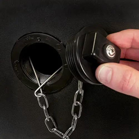 Close-up of the tethered plug on Powerful 270 Lb Poly Lawn Roller For Push Or Tow With Easy Turn Tethered Plug And Quick Filling Drum 18 By 24 Inches