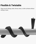 Flexible twist mount securely wrapped around a metal pole for indoor and outdoor security cameras in black.