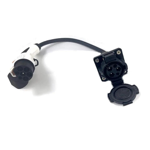 Badass 32A GBT To J1772 EVSE Adapter with black and white connectors for smooth electric vehicle charging.