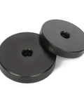 Two black interchangeable discs from the 52 In 1 Custom Bushing Driver Tool Set Pro Grade All In One Kit, side by side.