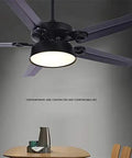 Modern Ceiling Fan With Smooth As Silk Airflow And Top Shelf Led Lighting Kit Includes Wireless Remote Three Chill Tones Bulletproof Iron Blades For Home And Office Decor in a sleek black finish over a dining table.