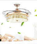 Top Shelf 42 Inch Invisible Ceiling Fan With Smooth Led Lighting Smart Folding Blades Barely Noticeable Spin Energy Efficient Wireless Remote Control For Kitchen Or Home Office in a cozy setting.