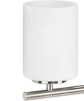 Close-up of etched white glass on brushed nickel base from Four Light Etched White Glass Modern Bathroom Vanity Light Replay Collection.