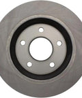 Centric C-Tek front brake rotor, gray metal finish with central hub bore and four lug holes.