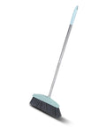 Grime Crushing Heavy Duty Broom With 34 Inch Long Handle for cleaning garage, patio, and indoor floors, featuring a blue handle.