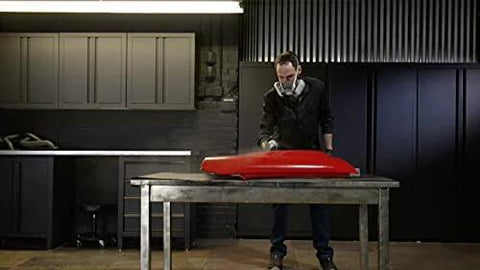 CAR-REP 2K polyurethane clear coat aerosol being applied to a red car hood on a worktable